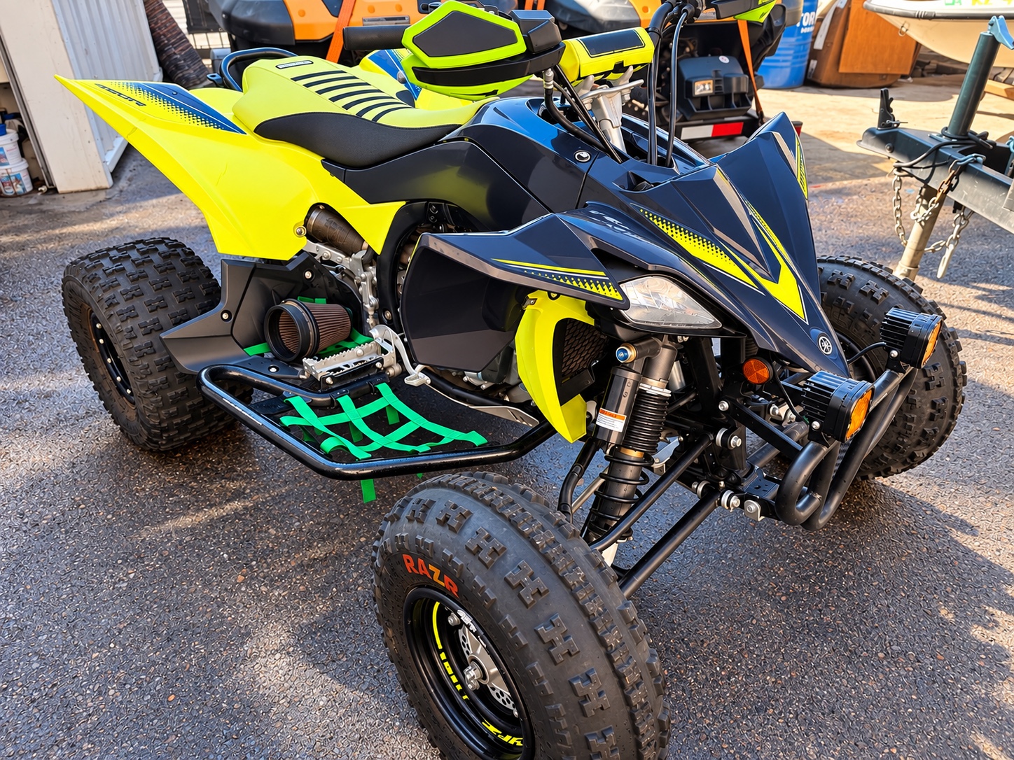 Customized Yamaha sport ATV outside the Phoenix powersports repair shop
